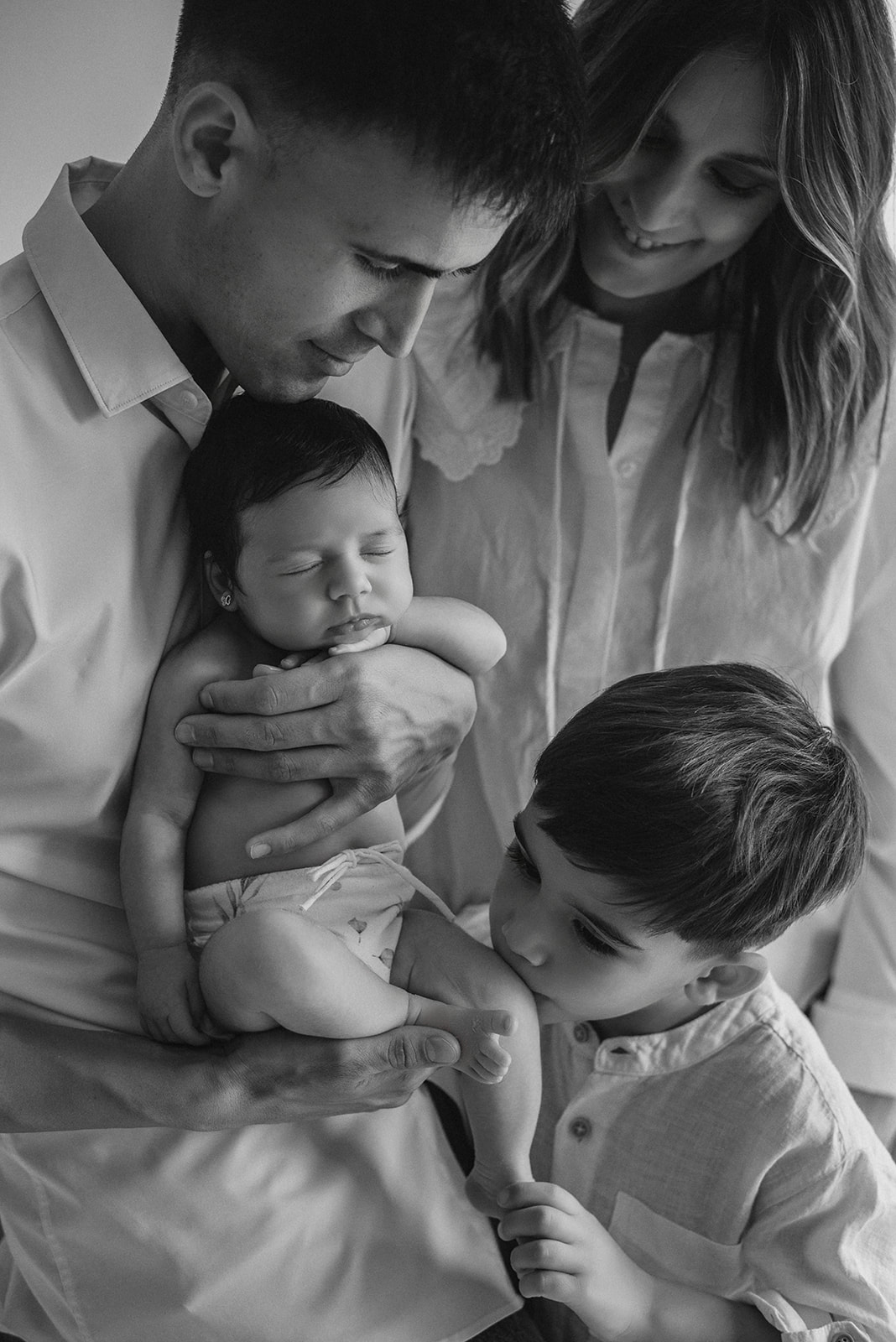 Familia con su recién nacido — Adriana López Fotografía